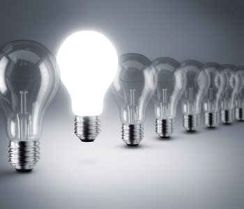 Group of lamp bulbs on black background. 3D illustration