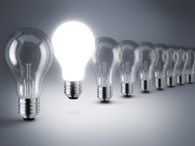 Group of lamp bulbs on black background. 3D illustration