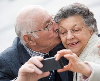 old couple taking a self portrait